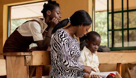 african-woman-teaching-kids-class